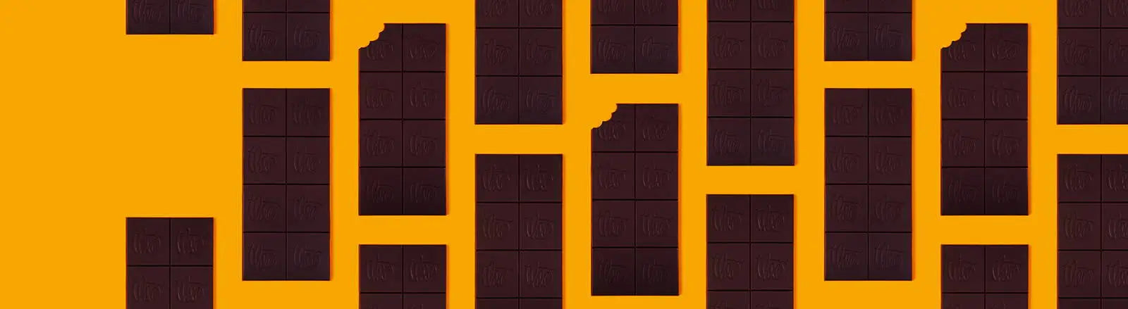 Pattern of Theo Chocolate Bars on a yellow background